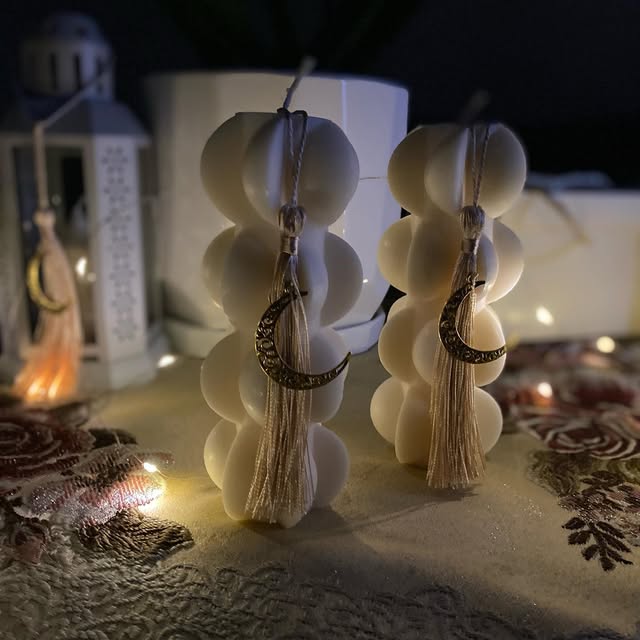 White bubble candles with crescent ornaments