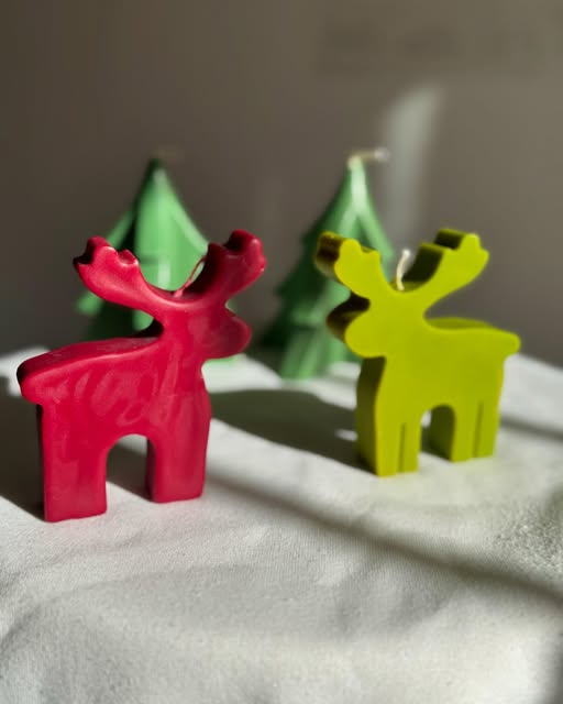 Colorful reindeer shaped candles